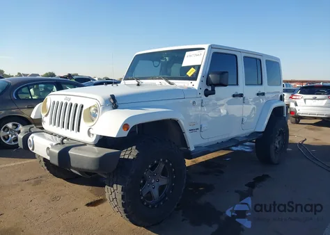 2015 Jeep Wrangler Unlimited Sahara from USA, damaged, VIN 1C4BJWEG9FL519182